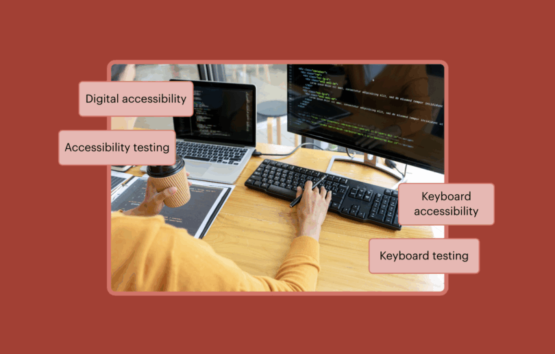 Person typing on a keyboard at a desk with code on screen, labeled with terms: digital accessibility, accessibility testing, keyboard accessibility, and keyboard testing.