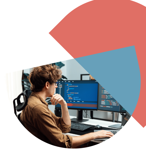 Person sitting at a desk working on a computer