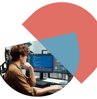 Person sitting at a desk working on a computer