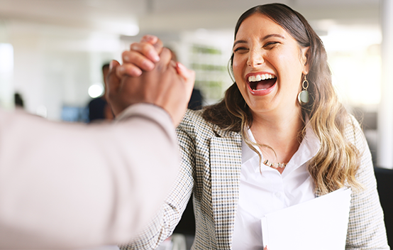 An account executive celebrating