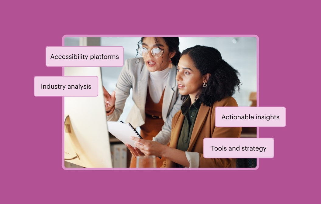Two colleagues reviewing information on a computer screen. The callout text reads Accessibility platforms, Industry analysis, Actionable insights, and Tools and strategy.