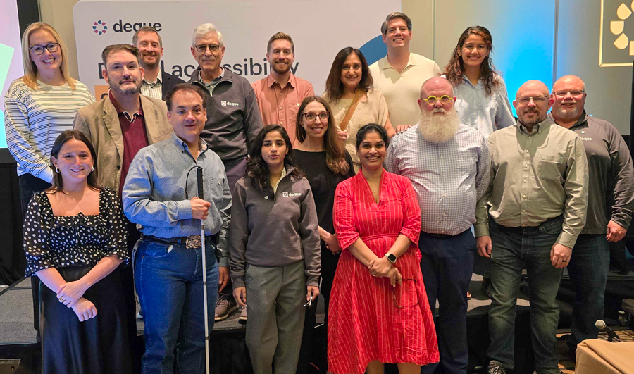 Over a dozen Deque employees gathered at an accessibility conference