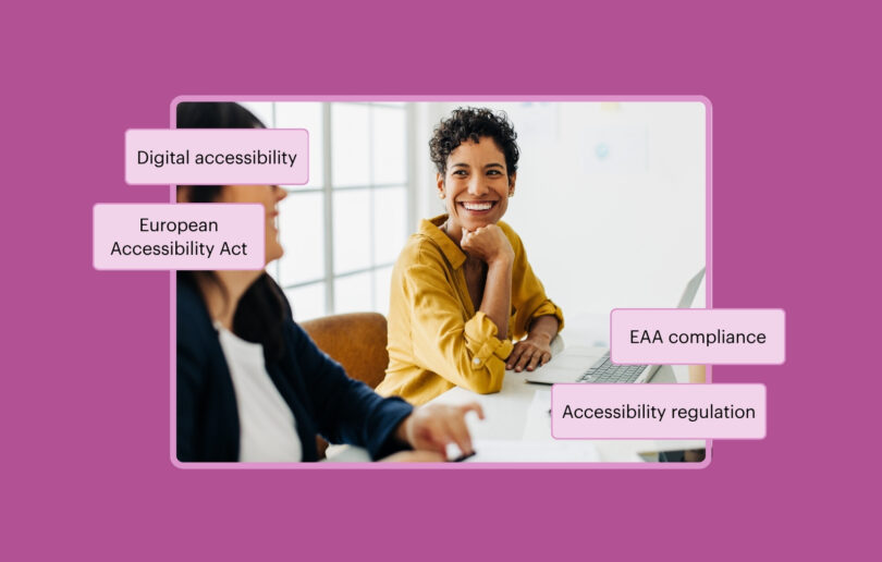 Two people at a desk with a laptop. One person is smiling broadly at the other. Floating text reads, Digital Accessibility, EAA compliance, and Accessibility regulation.